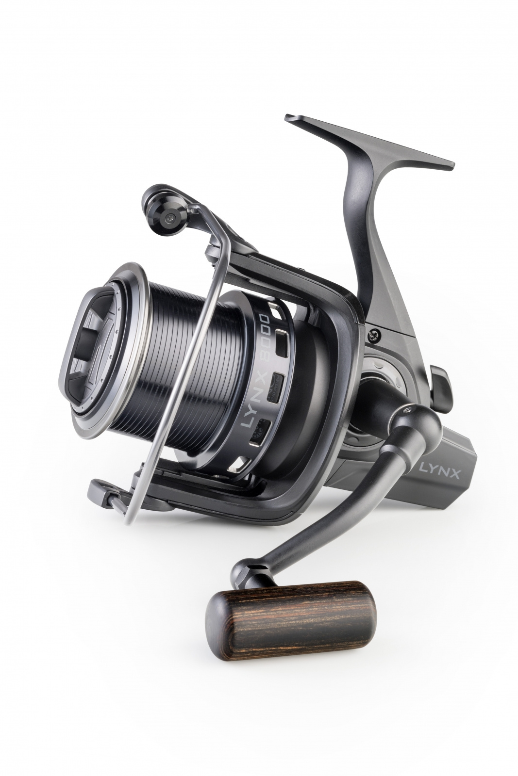 низкопрофильная катушка для рыбалки. катушка больших размеров. большая катушка. большая катушка. большая катушка.